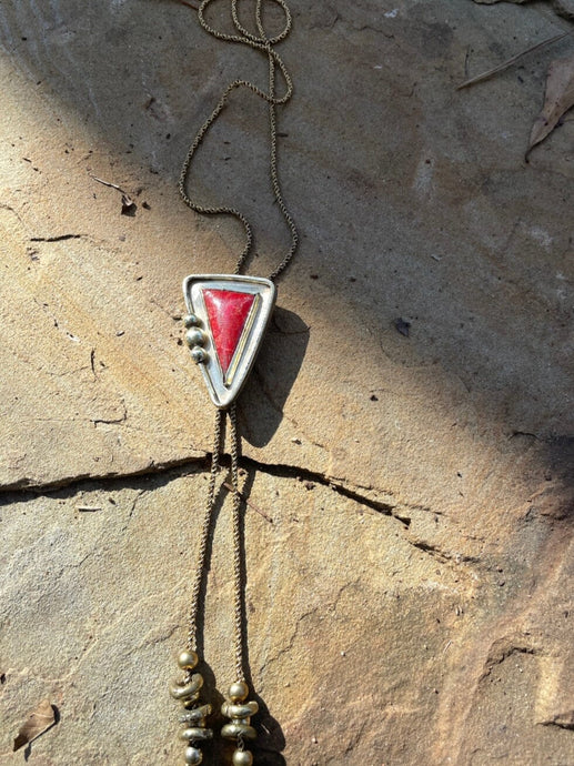 Red Coral Bolo with Chain Fossil and Hide 