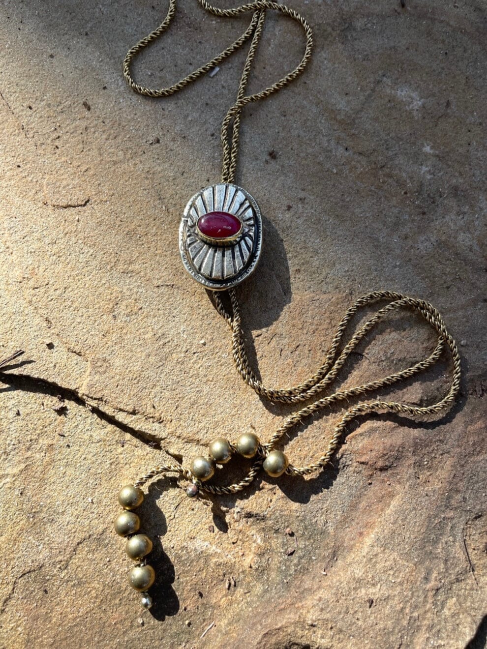 Ruby All Seeing Eye Bolo with Chain Fossil and Hide 